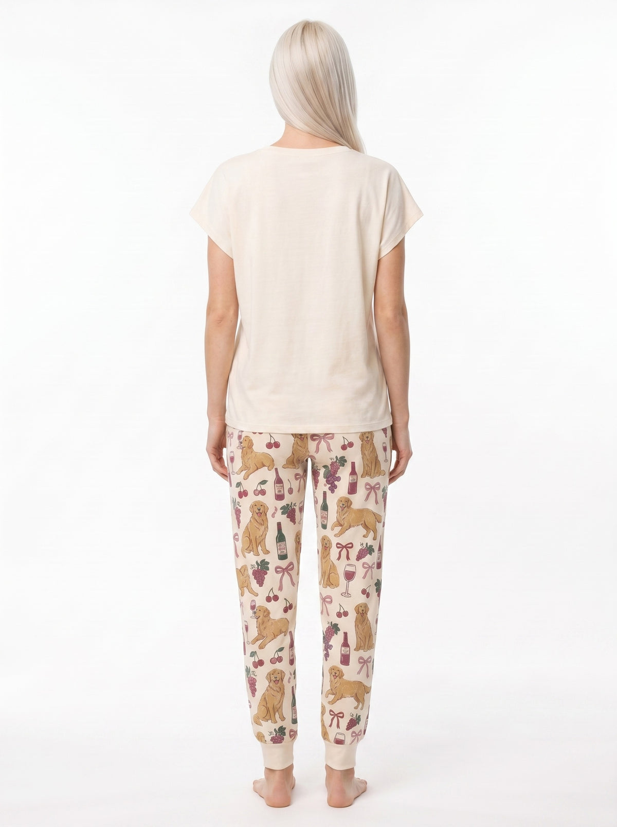 Women's soft knit pajama set with golden retriever wine graphic tee and all-over print jogger pants, cream and dusty rose palette